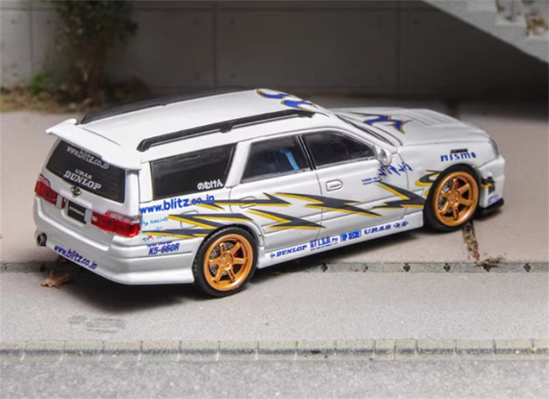 ZOOM Nissan R34 Stagea WC34 260RS White Gold Wheel
nismo DUNLOP GTLSB URAS 1:64 Car Pre-built Model view6