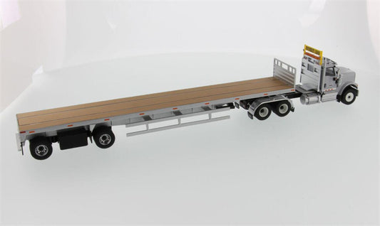 CATERPILLAR International HX520 Tandem Tractor with 53′ Flat Bed Trailer – Light grey truck + Silver trailer 1:50 Truck Pre-built Model