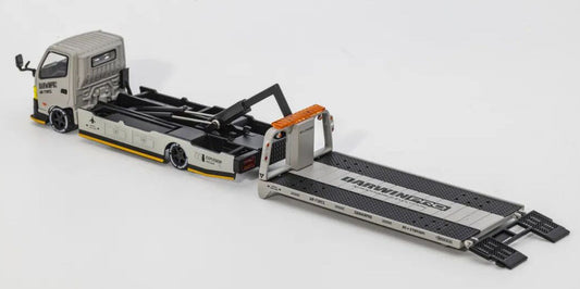 GCD x DarwinPRO 1:64 Hino 300 Dutro flatbed truck from a front-left three-quarter angle with Air Force Grey body and rear loading rails