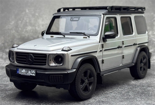 NOREV 2024 Mercedes Benz G500 G-Class off-road Silver luggage rack version 1:18 Car Pre-built Model view1