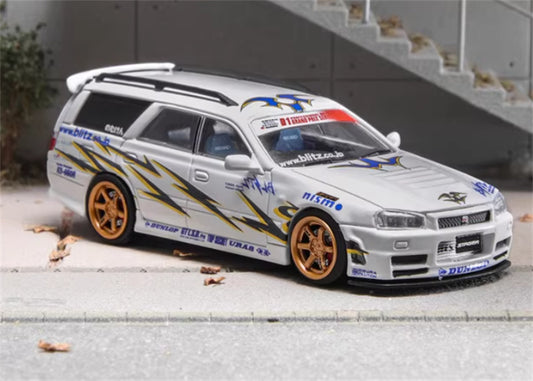 ZOOM Nissan R34 Stagea WC34 260RS White Gold Wheel 
nismo DUNLOP GTLSB URAS 1:64 Car Pre-built Model view1