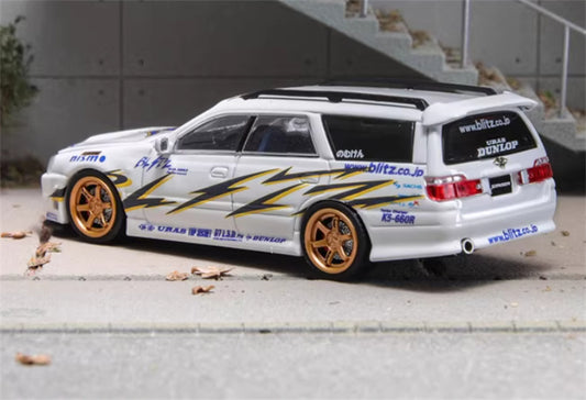 ZOOM Nissan R34 Stagea WC34 260RS White Gold Wheel 
nismo DUNLOP GTLSB URAS 1:64 Car Pre-built Model view2