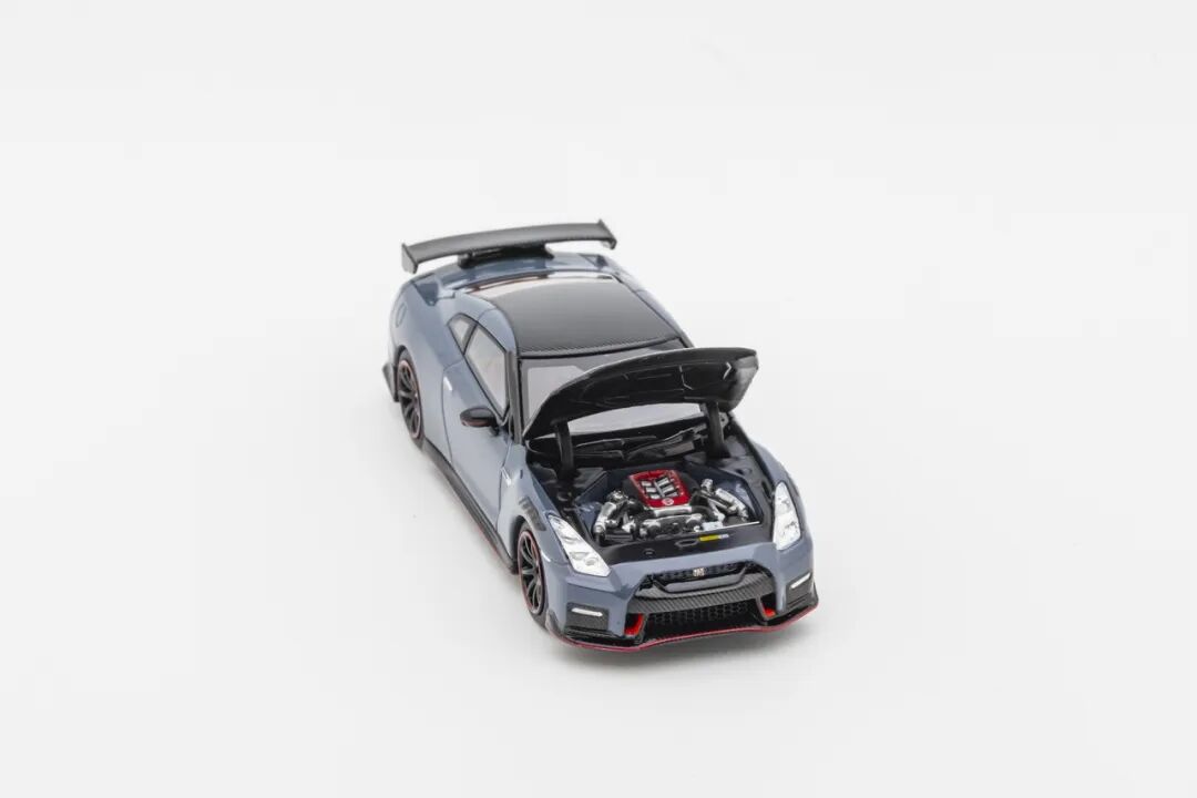 MOTORHELIX Nissan GT-R R35 Nismo 2022 1:64 diecast model with opening hood