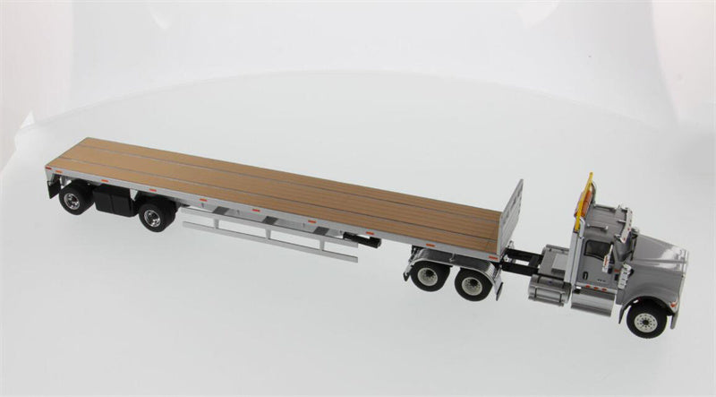 CATERPILLAR  International HX520 Tandem Tractor with 53′ Flat Bed Trailer – Light grey truck + Silver trailer 1:50 Truck Pre-built Model