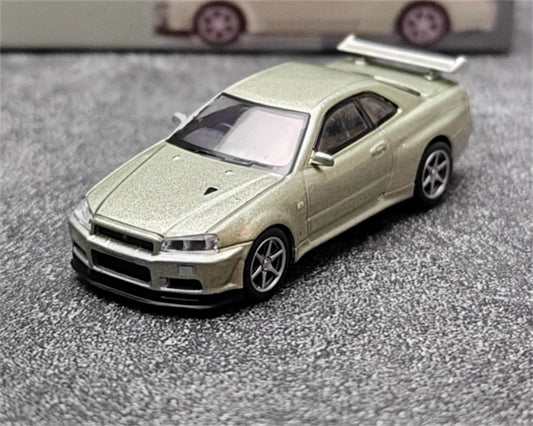 MINIGT Nissan Kyline GT-R R34 V-Spec II Nur Millenium Jade color box packaging 1:64 Car Pre-built Model view1