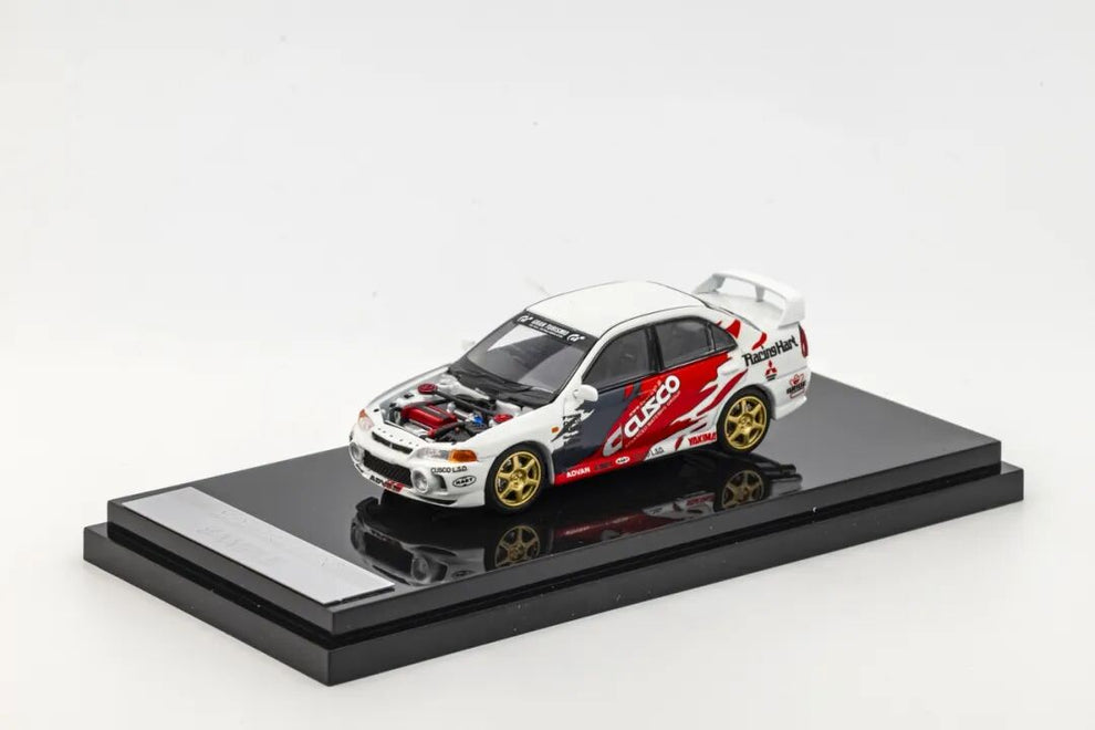 MOTORHELIX Mitsubishi Lancer Evolution IV GSR Cusco 1:64 model reference