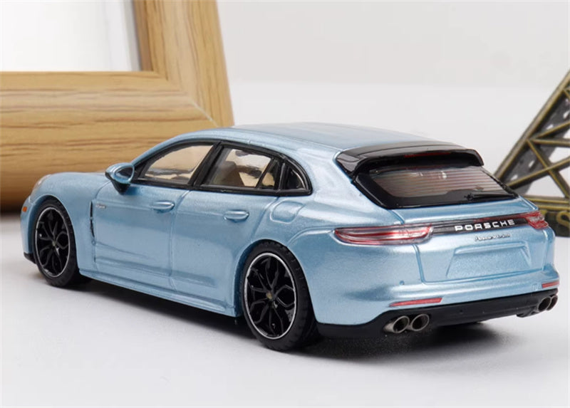 Liberty 64 Porsche Panamera Turbo S ice blue w/ Figure and wheels 1:64 Car Pre-built Airliner Model Display view6