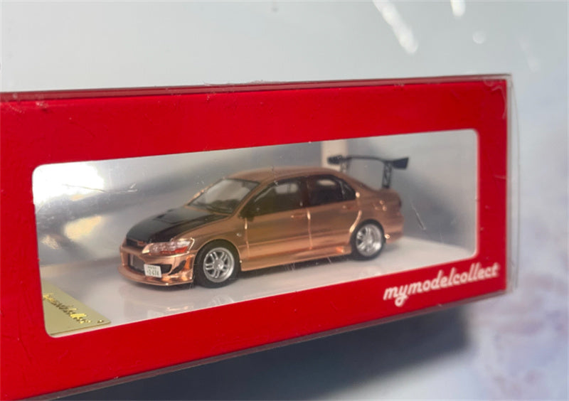 mymodelcollect Mitsubishi Lancer Evolution EVO VII four door sports car Rose gold carbon cover 1:64 Car Pre-built Model view1