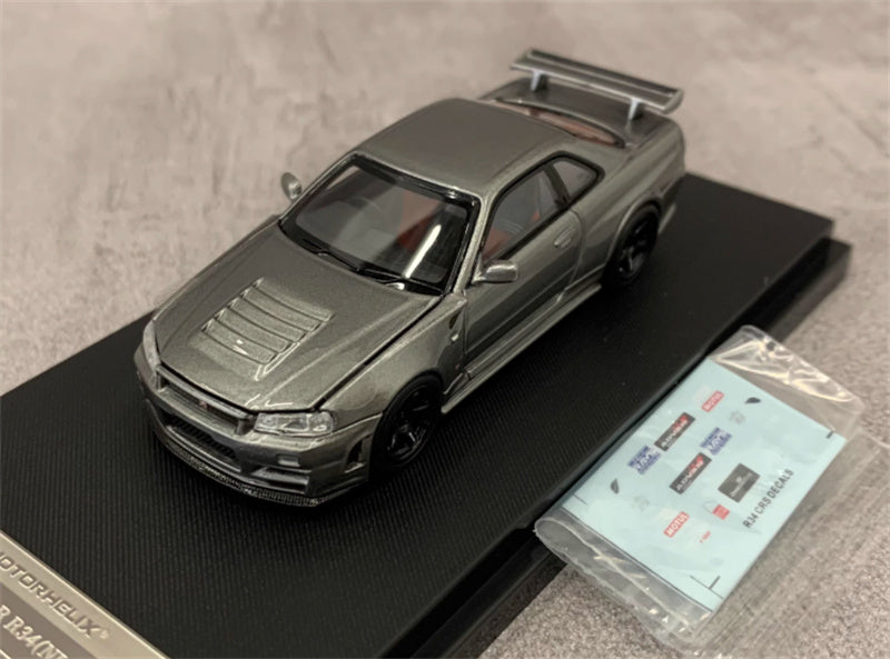 MOTORHELIX NISSAN SKYLINE GT-R R34 (NISMO) CRS VER Metallic Grey Limited Edition 699PCS ONLY 1:64 Car Pre-built Model view1