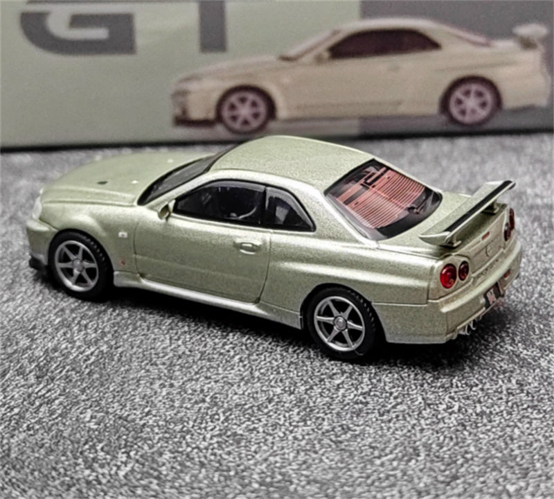 MINIGT Nissan Kyline GT-R R34 V-Spec II Nur Millenium Jade color box packaging 1:64 Car Pre-built Model view2