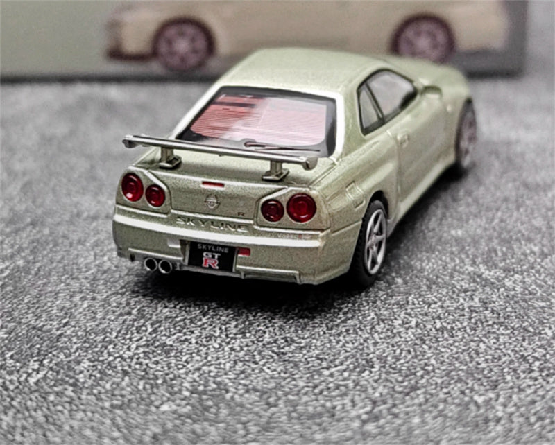MINIGT Nissan Kyline GT-R R34 V-Spec II Nur Millenium Jade color box packaging 1:64 Car Pre-built Model view6