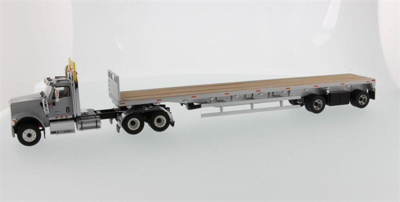 CATERPILLAR  International HX520 Tandem Tractor with 53′ Flat Bed Trailer – Light grey truck + Silver trailer 1:50 Truck Pre-built Model
