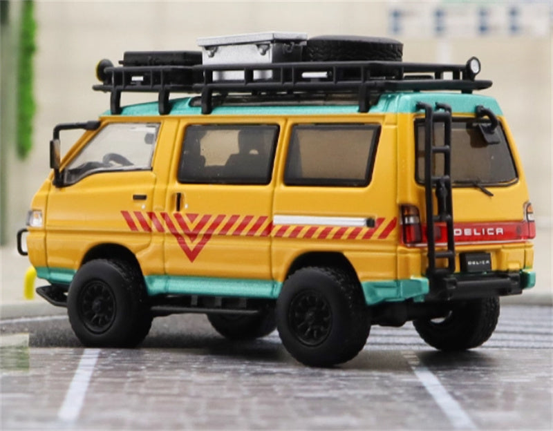 Autobots Models Mitsubishi Delica 3rd Generation Wagon 4X4 Off Road Modified Edition Yellow School Bus left-hand drive with accessories 1:64 Car Pre-built Model view4