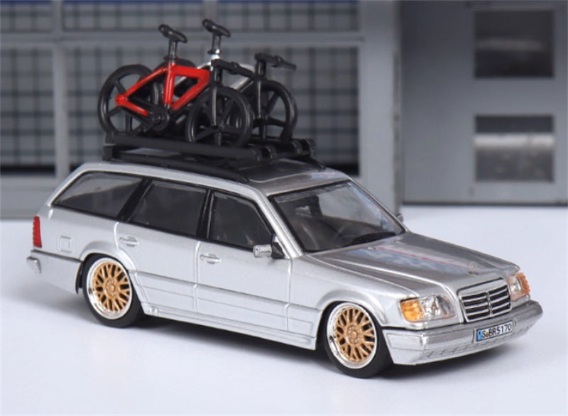 Mortal Mercedes Benz E-Class E300 station wagon S124 with 2 bicycles and luggage rack Silver - Golden Wheel low slung version Limited Edition 599PCS ONLY 1:64 Car Pre-built Model view1