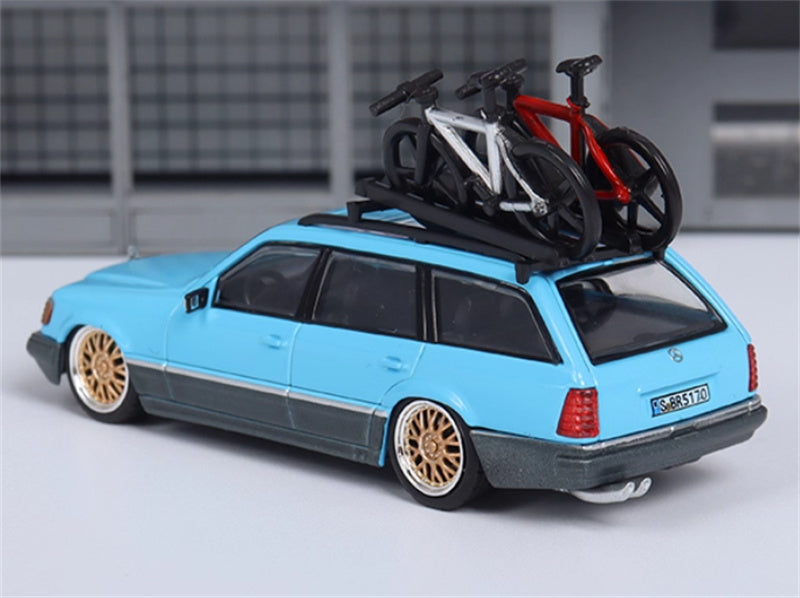 Mortal Mercedes Benz E-Class E300 station wagon S124 with 2 bicycles and luggage rack lake blue - Gold Wheel low slung version Limited Edition 299PCS ONLY 1:64 Car Pre-built Model view3