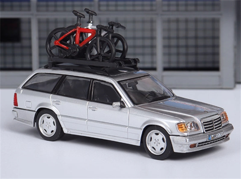 Mortal Mercedes Benz E-Class E300 station wagon S124 with 2 bicycles and luggage rack Silver - Silver Wheel Regular Edition Limited Edition 599PCS ONLY 1:64 Car Pre-built Model view1