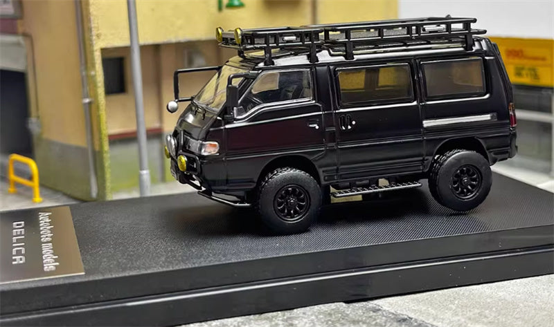 Autobots Models Mitsubishi Delica 3rd Generation Wagon 4X4 Off Road Modified Edition Black left-hand drive with accessories 1:64 Car Pre-built Model view3