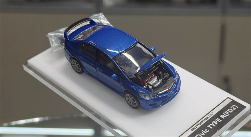 MOTORHELIX The hood can be opened, and a hubcap is included. 1:64 car Pre-built Model view3