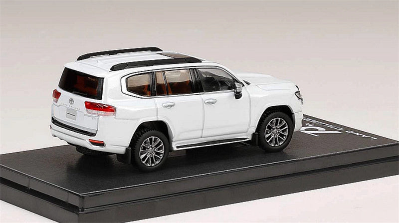 Hobby JAPAN TOYOTA LAND CRUISER JA300W ZX White Pearl - Silver Wheel 1:64 Car Pre-built Model view1