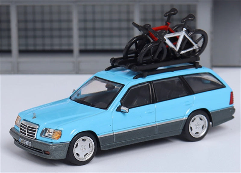 Mortal Mercedes Benz E-Class E300 station wagon S124 with 2 bicycles and luggage rack lake blue - Silver Wheel Regular Edition Limited Edition 299PCS ONLY 1:64 Car Pre-built Model view1