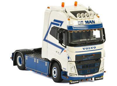 WSI VOLVO FH4 GLOBETROTTER XL 4X2 Space Cab DE MAN TRANSPORT 1/50 Truck view1
